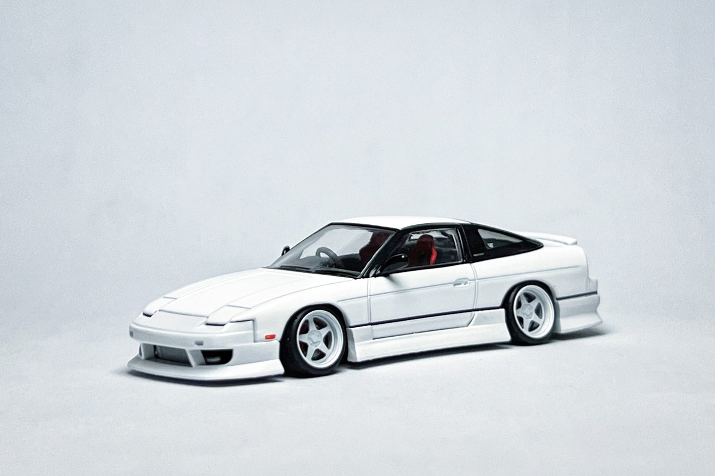 1:64 scale TLV N235b Nissan 180SX white custom diecast with HSY kit and deep-dish bearing wheels