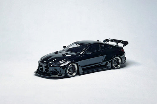 1:64 scale SW BMW G82 M4 ADRO widebody metallic black custom diecast with deep-dish bearing wheels