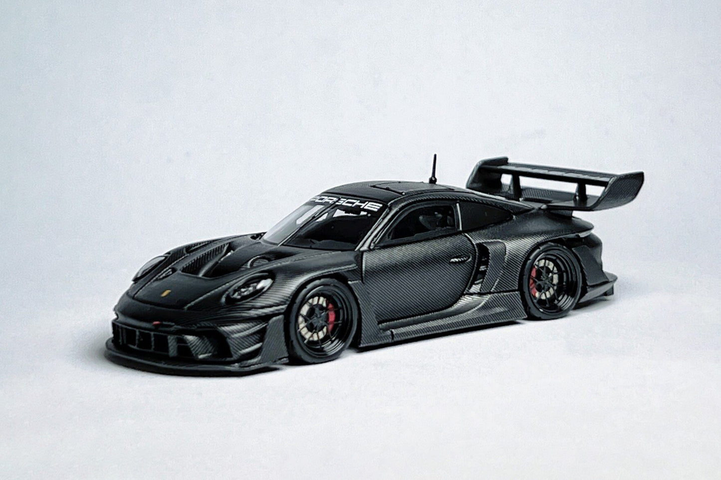 1:64 scale HKM Porsche 911 992 GT3 R Rennsport full carbon black custom diecast with deep-dish wheels
