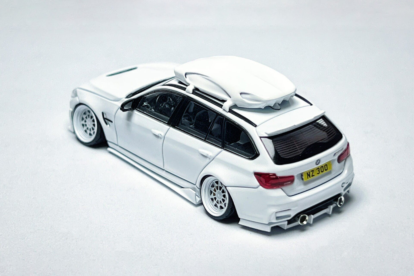 1:64 BMW F81 M3 CS Touring white custom diecast with visible license plate markings