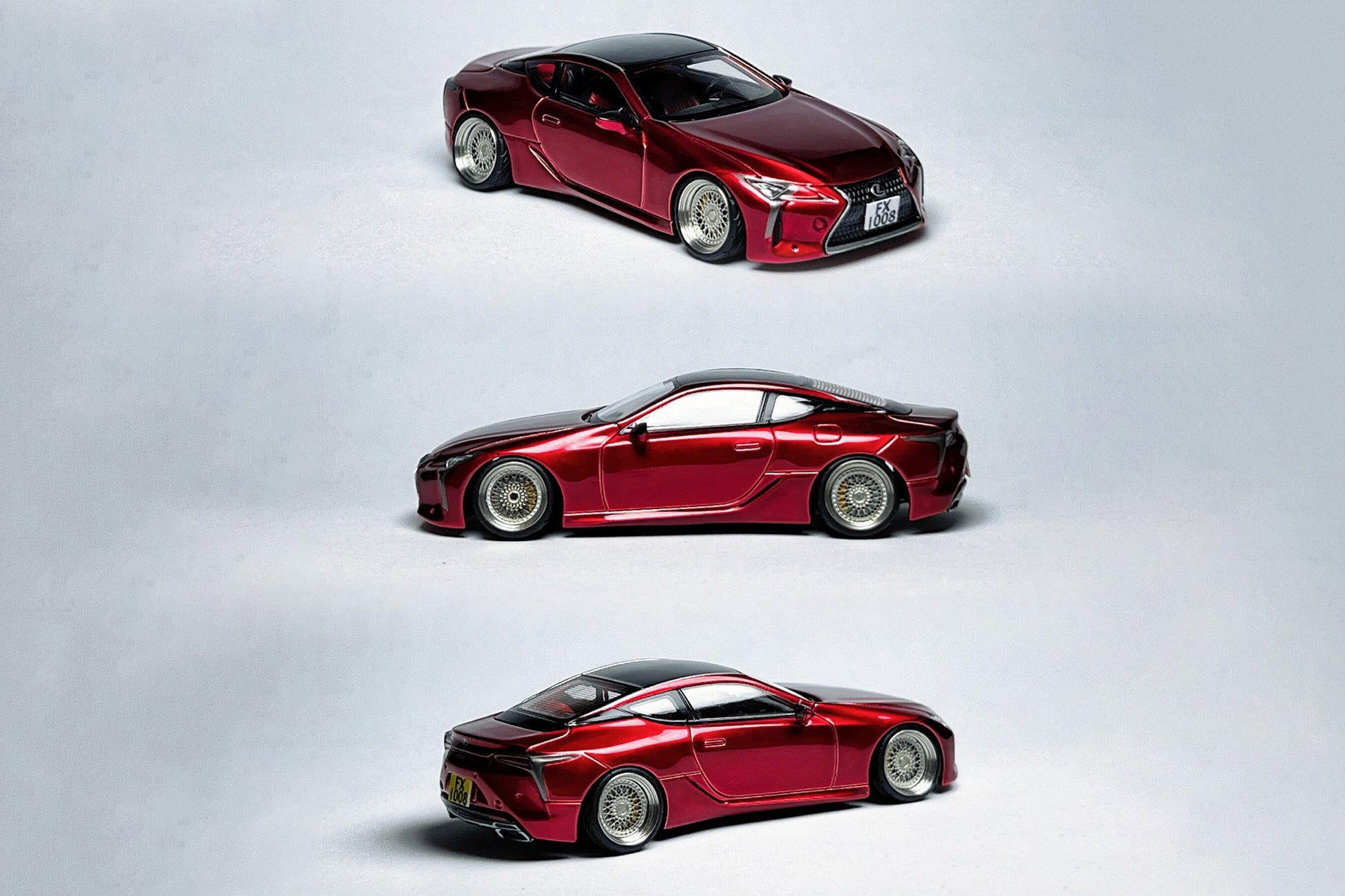 Custom 1:64 Lexus LC500h metallic red diecast model with deep-dish bearing wheels