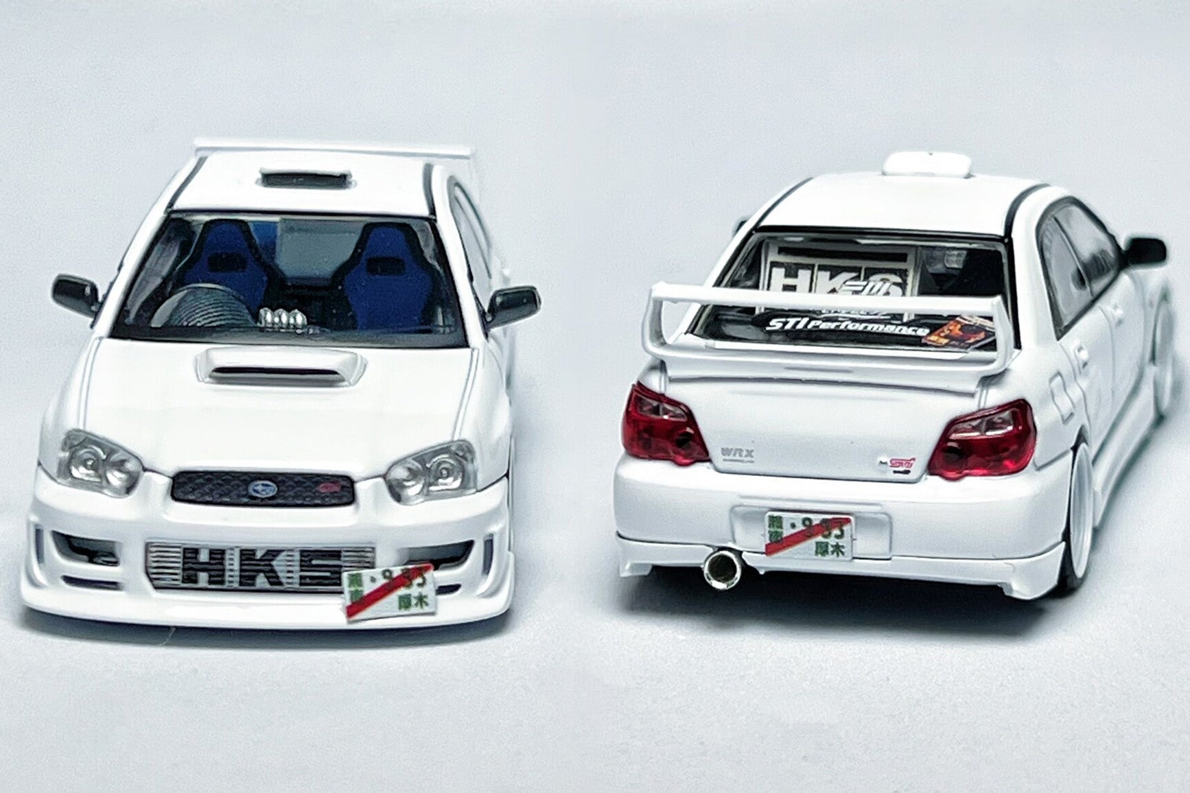 Custom 1:64 Subaru Impreza WRX STI white diecast model with STI branding