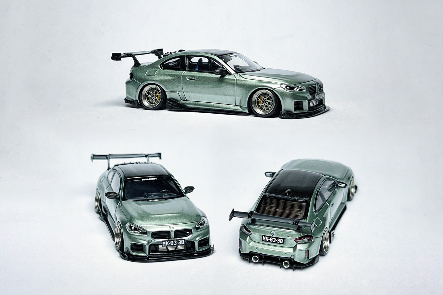 1:64 BMW M2 G87 Jade Green custom diecast model with visible license plate markings