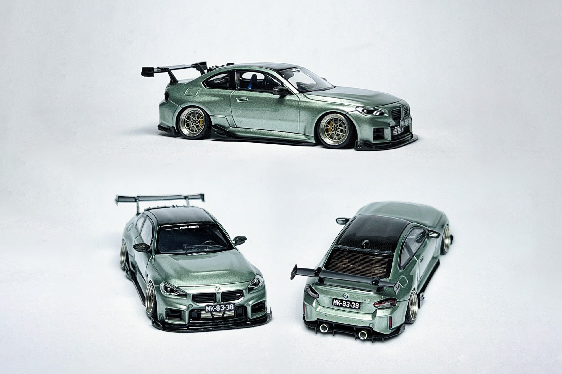 1:64 BMW M2 G87 Jade Green custom diecast model with visible license plate markings
