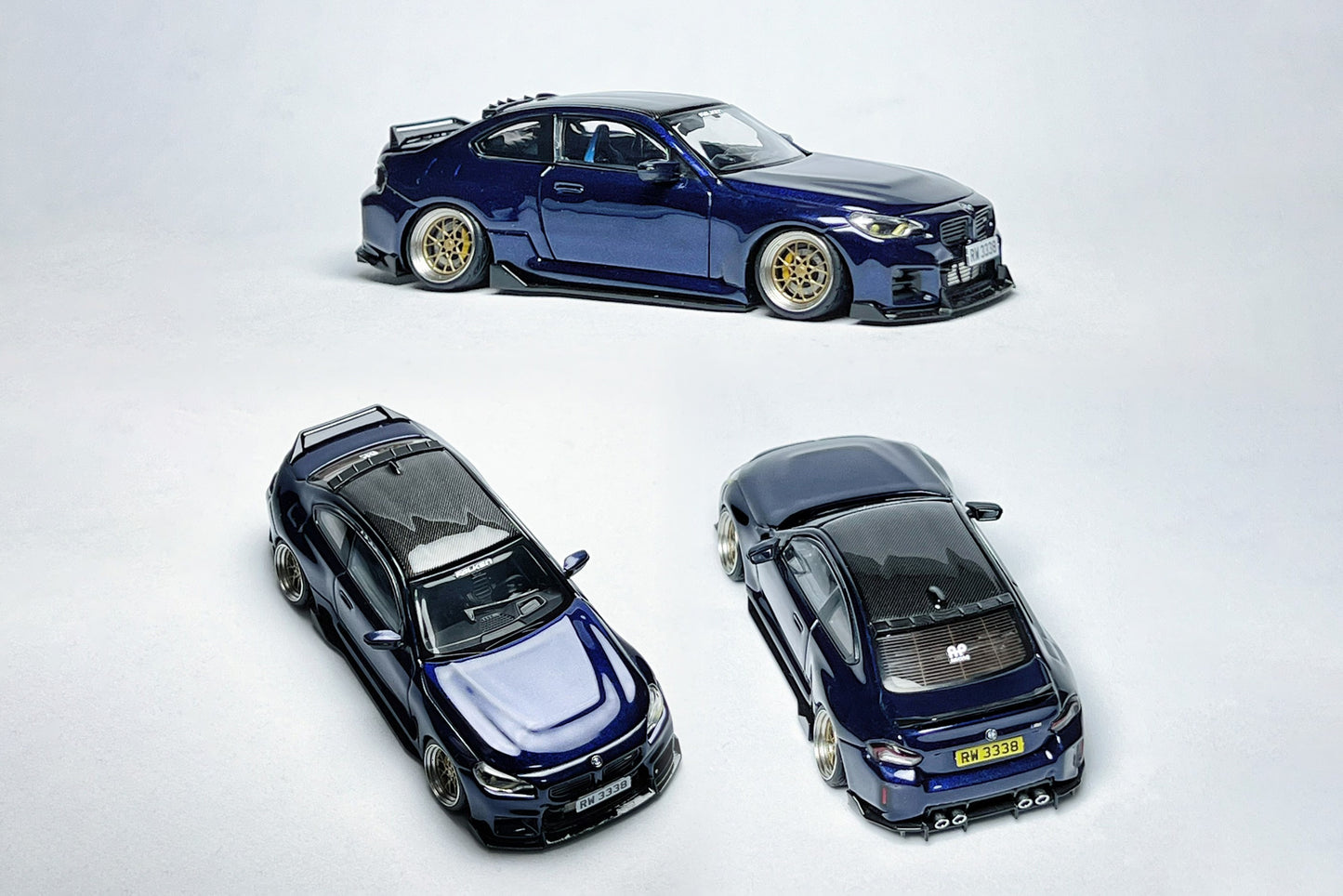 Custom 1:64 BMW M2 G87 Tanzanite Blue diecast model with visible branding