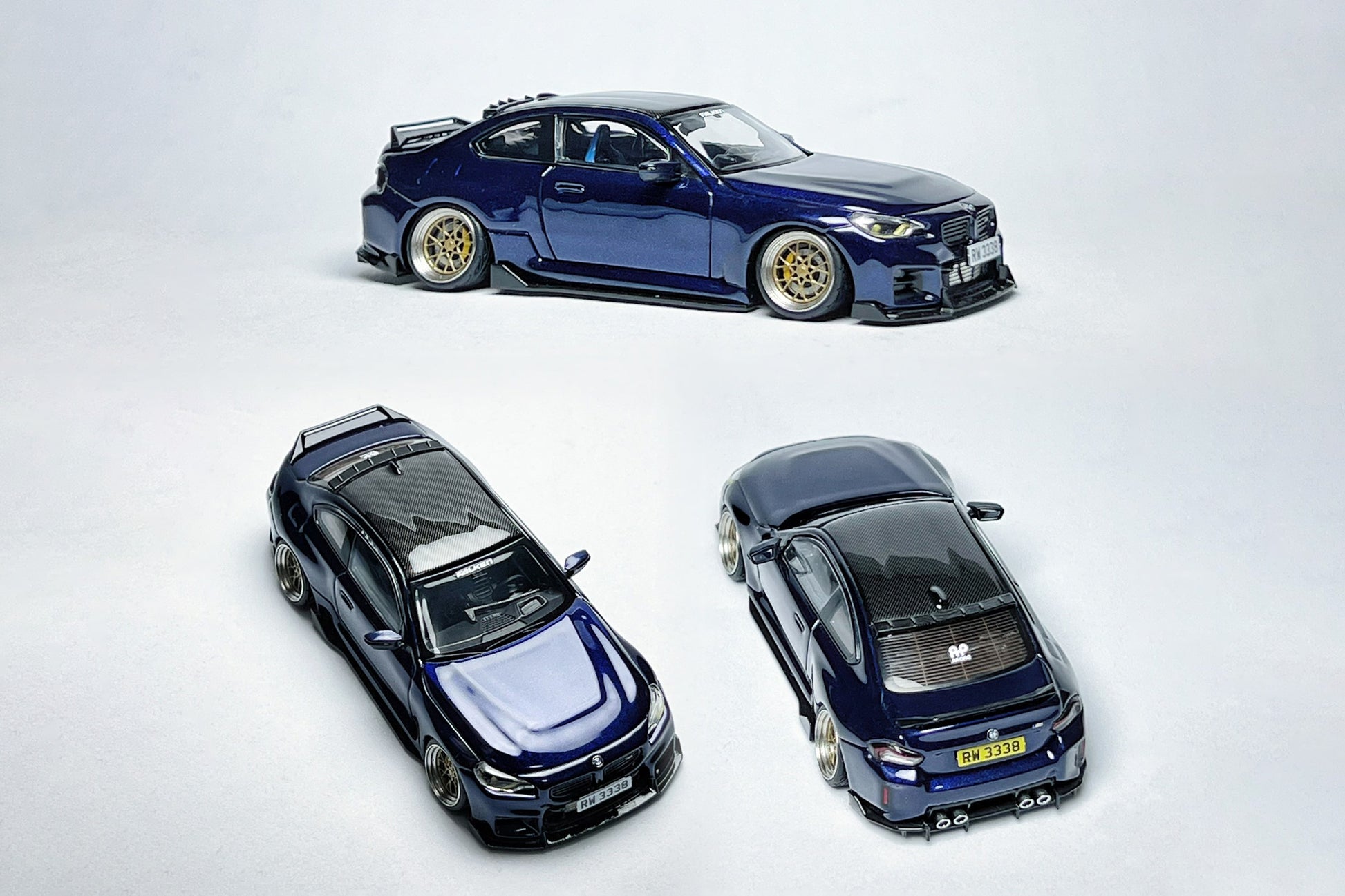 Custom 1:64 BMW M2 G87 Tanzanite Blue diecast model with visible branding