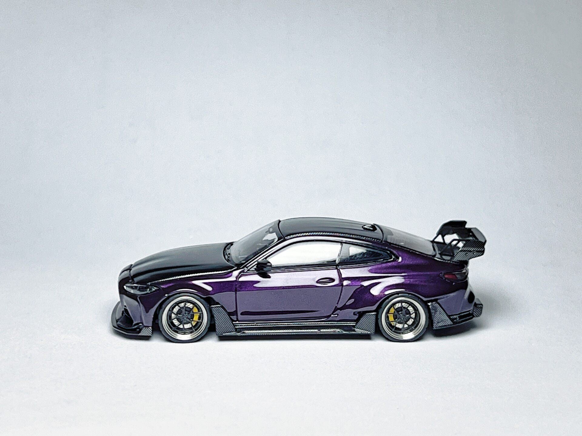 Custom 1:64 BMW G82 M4 ADRO widebody purple diecast model with carbon roof