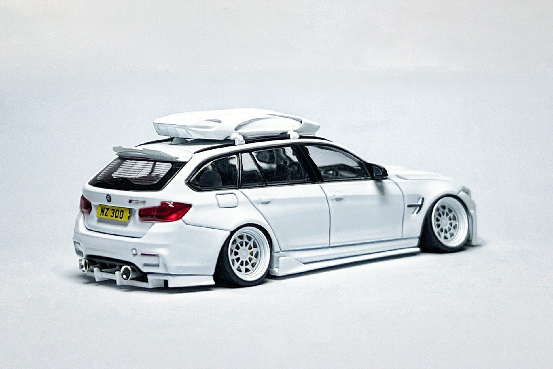Custom 1:64 BMW F81 M3 CS Touring white diecast model with Hatta White Ghost kit