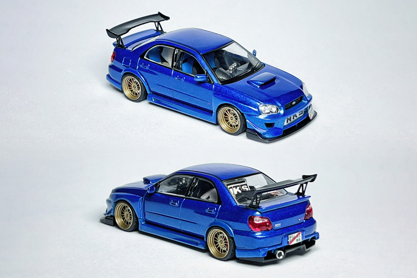 1:64 Subaru Impreza WRX STI metallic blue custom diecast with visible text markings