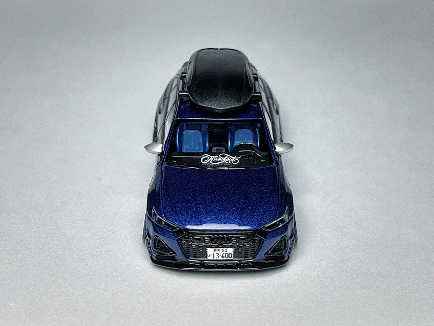 Custom 1:64 Audi RS6-R ABT 574 Navarra Blue diecast model with visible text markings