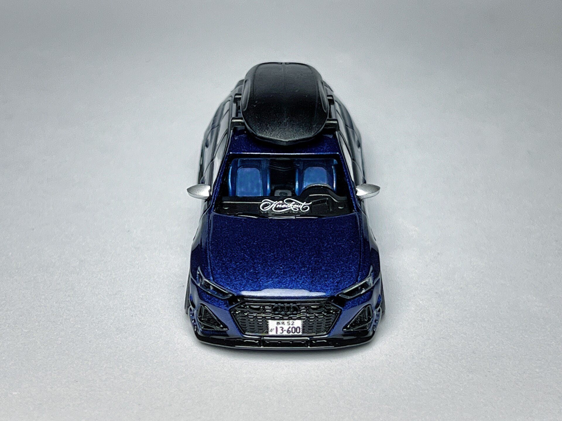 Custom 1:64 Audi RS6-R ABT 574 Navarra Blue diecast model with visible text markings