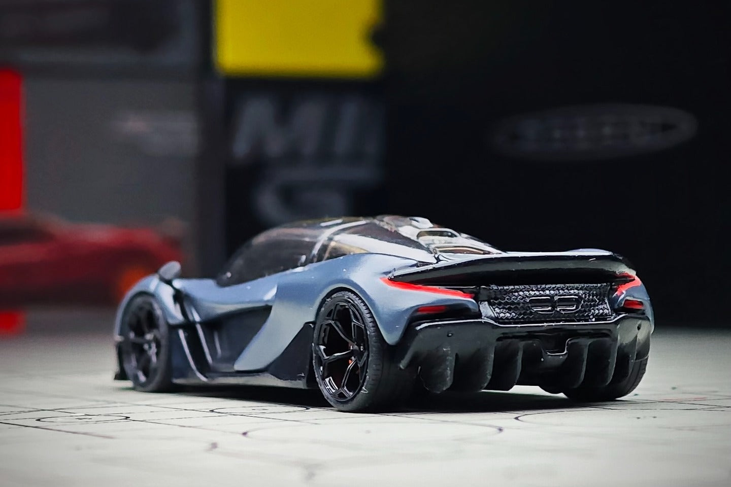 Custom modified 1:64 McLaren W1 diecast model with dynamic wheels