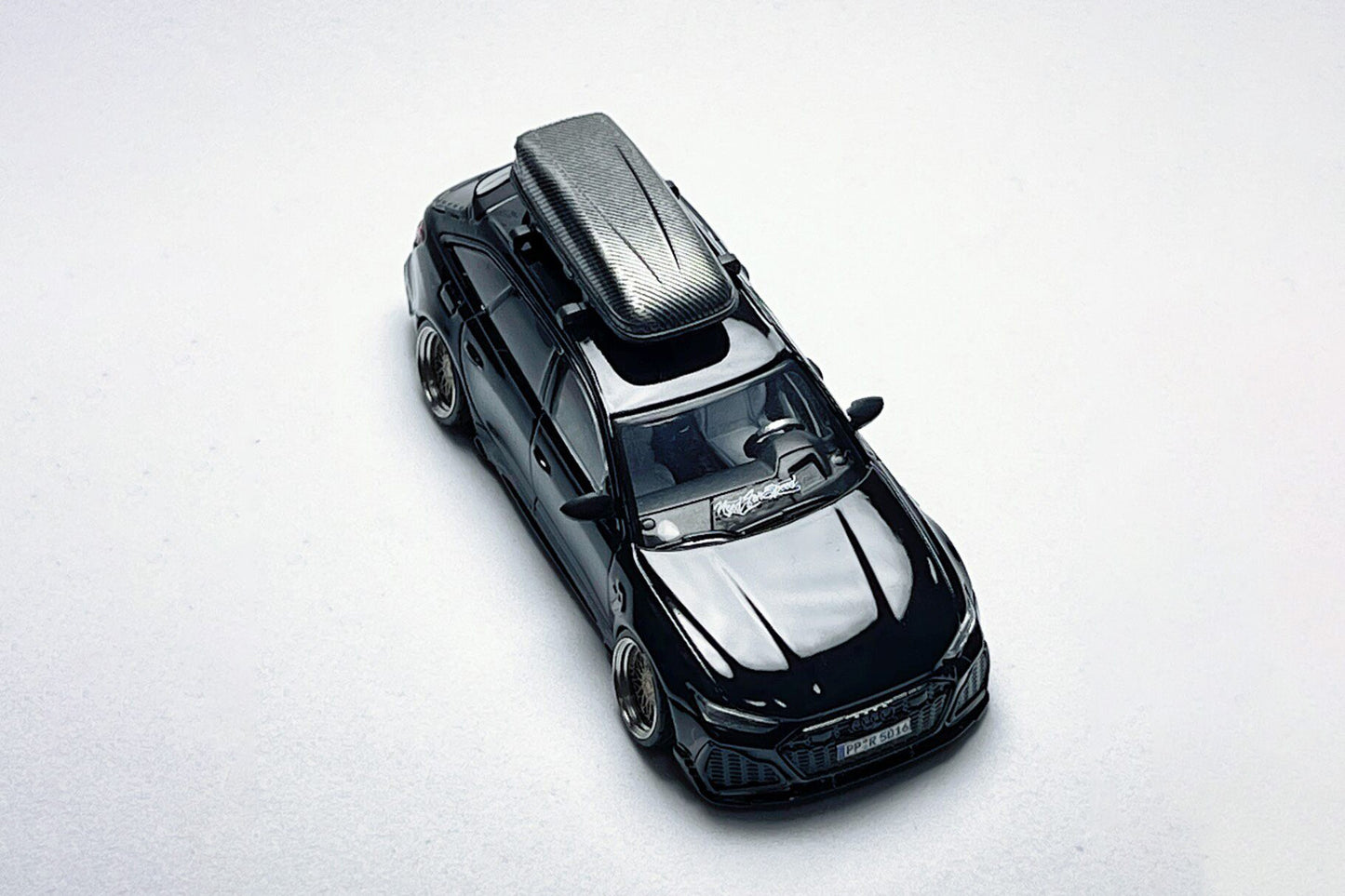 Custom 1:64 MINI GT Audi RS6-R ABT 514 Navarra Black Warrior diecast model with carbon roof cargo box