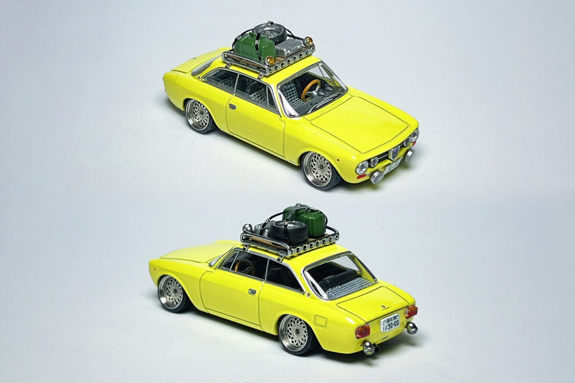 Custom 1:64 Alfa Romeo 155c yellow rally diecast model with roof rack