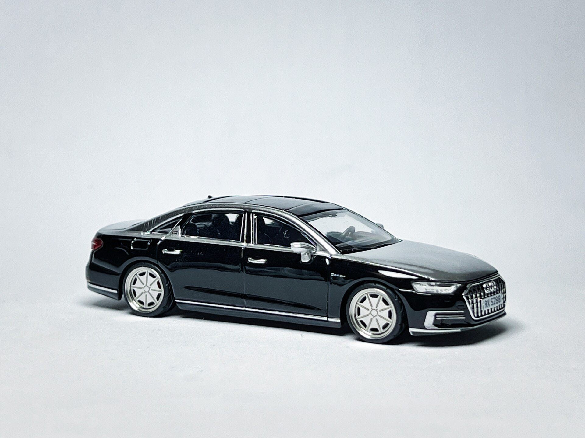 Custom 1:64 Audi A8 L Horch black and silver diecast model with deep-dish bearing wheels