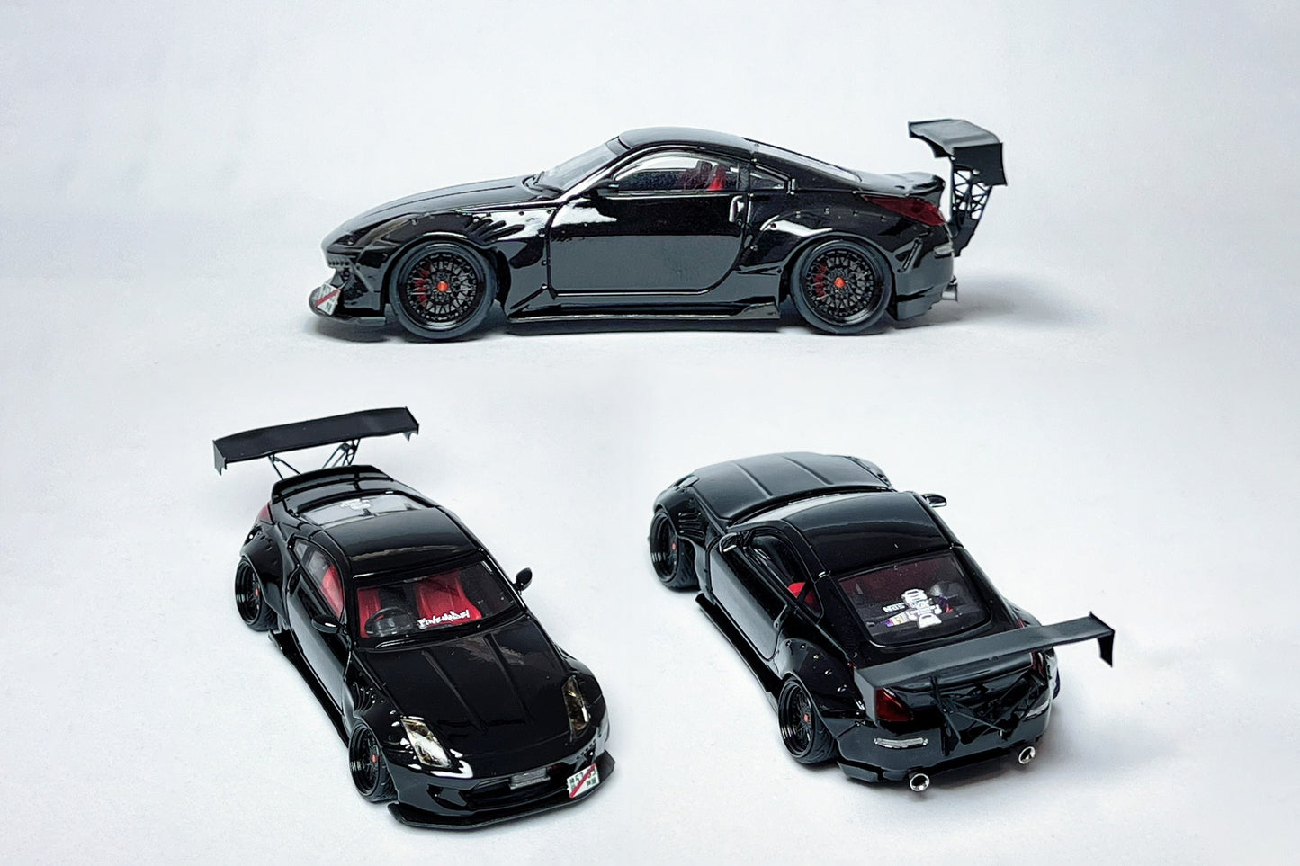 Custom 1:64 Nissan 350Z black widebody diecast Demon Lady Z with deep-dish wheels