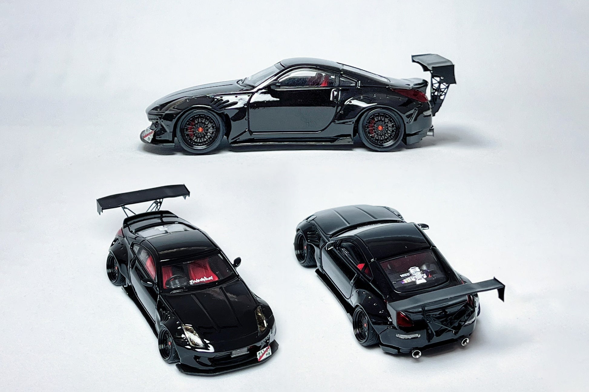 Custom 1:64 Nissan 350Z black widebody diecast Demon Lady Z with deep-dish wheels