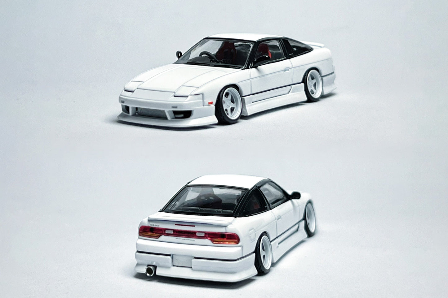 Custom 1:64 Nissan 180SX white diecast model with HSY kit and deep-dish bearing wheels