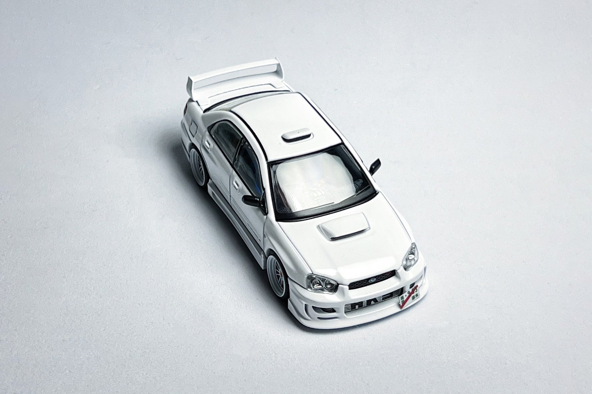 1:64 Subaru Impreza WRX STI white custom diecast with deep-dish wheels