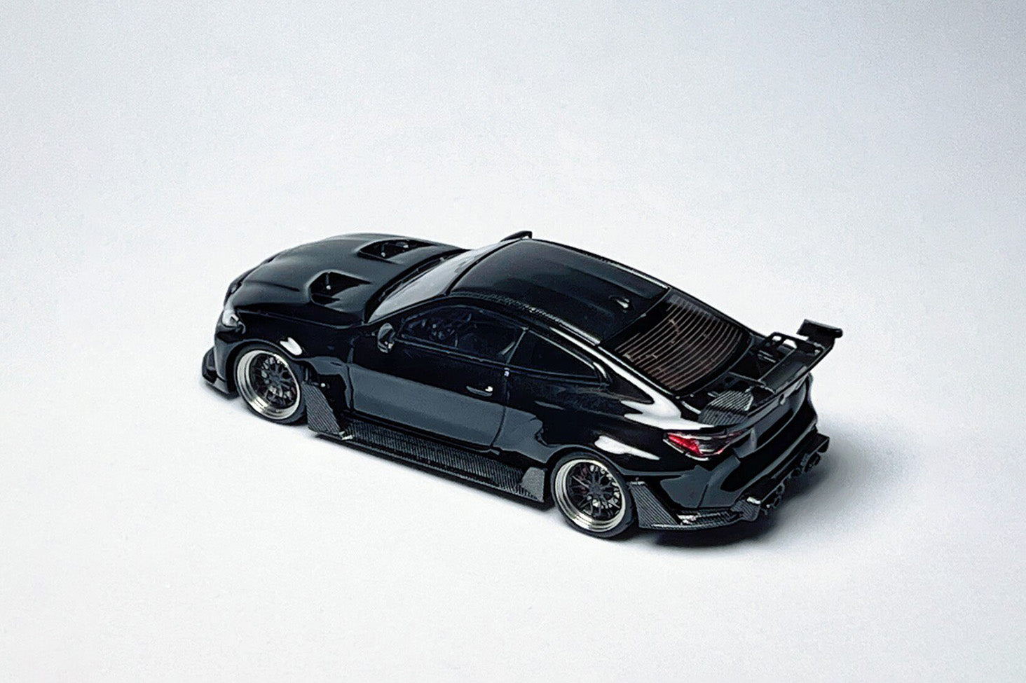 Custom 1:64 BMW G82 M4 ADRO widebody metallic black diecast model