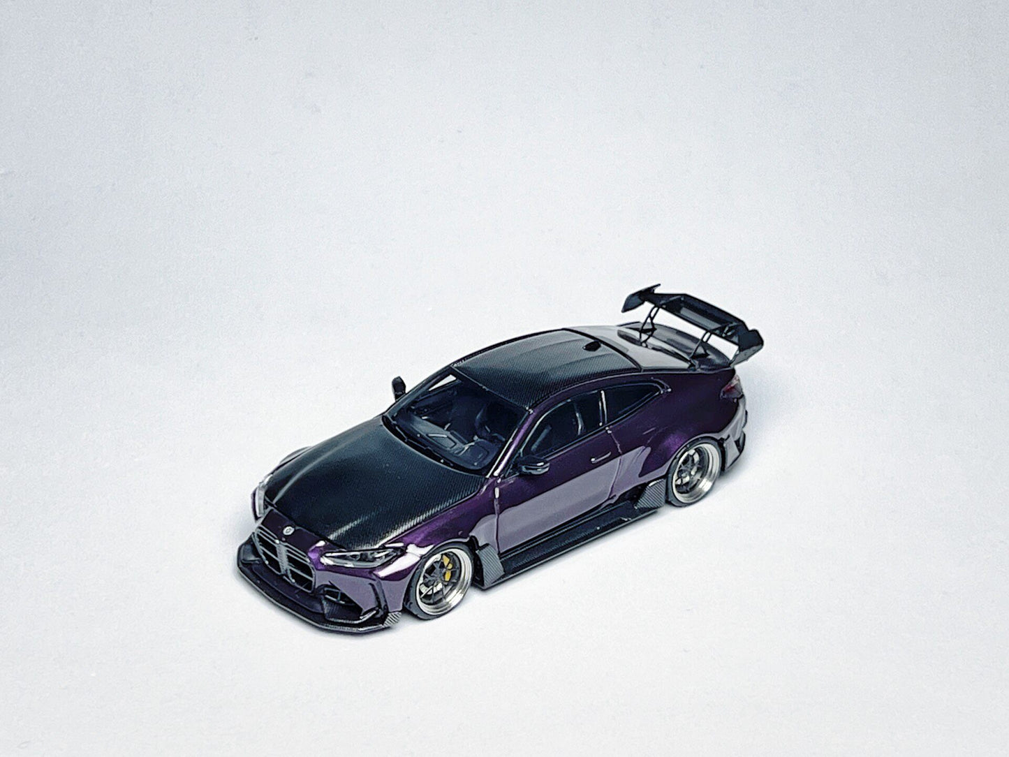 Custom 1:64 BMW G82 M4 ADRO widebody purple diecast model with carbon roof
