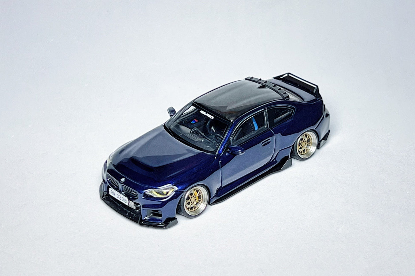 Custom 1:64 BMW M2 G87 Tanzanite Blue diecast model with KJ Model ADRO ducktail