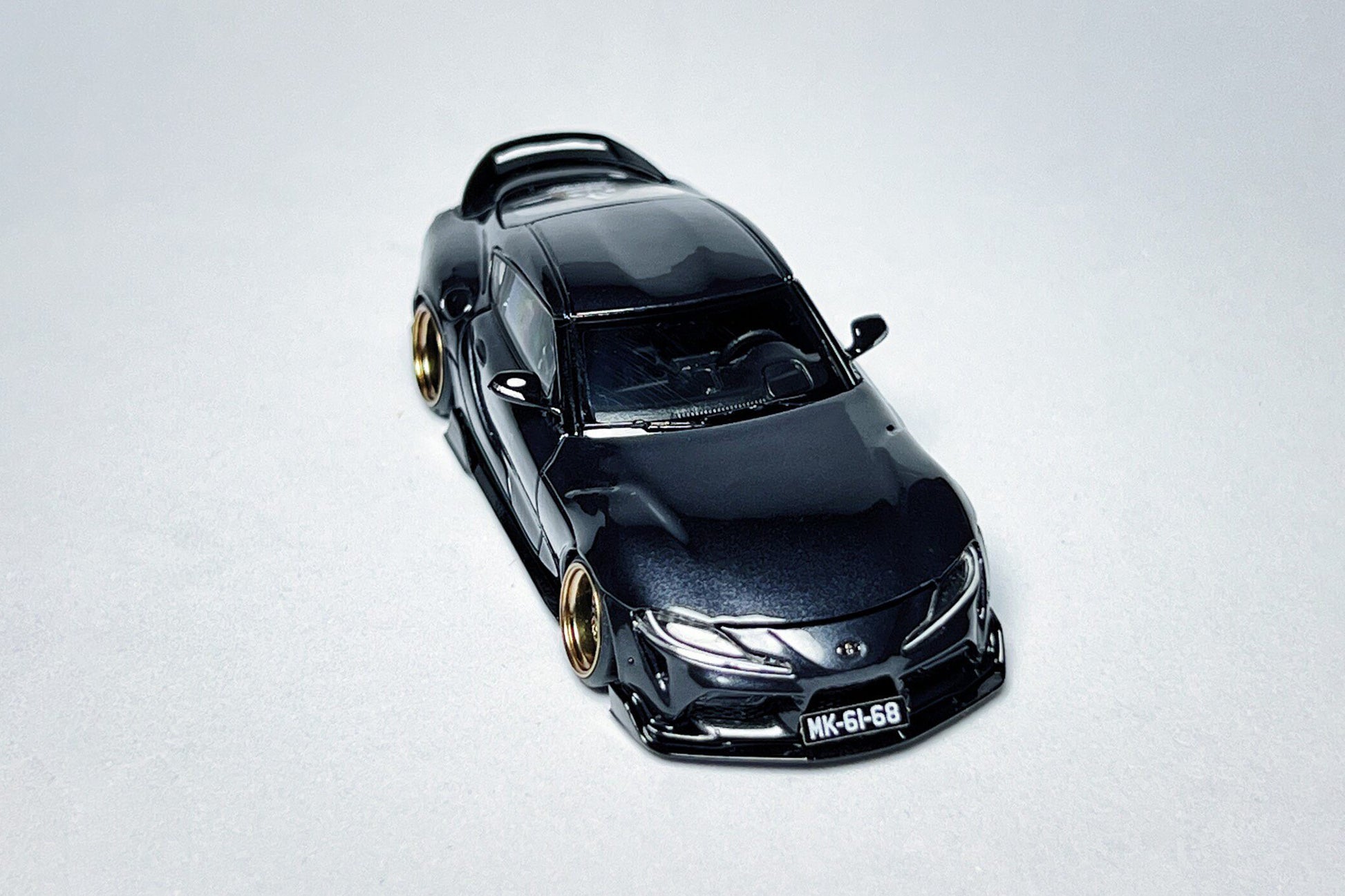 Custom 1:64 FH Toyota GR Supra A90 diecast model with ducktail spoiler
