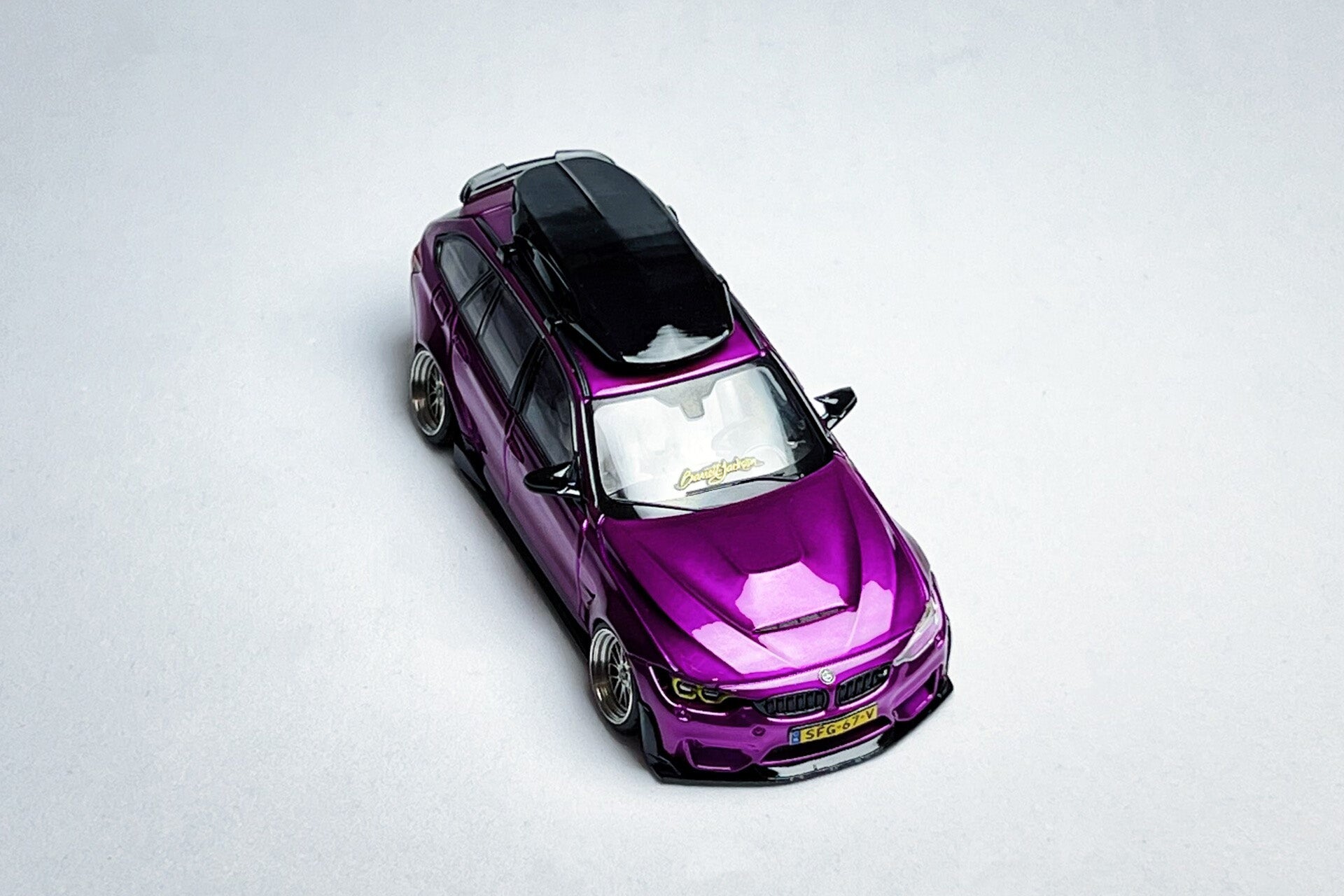 Custom 1:64 BMW F81 M3 CS Touring metallic purple diecast model