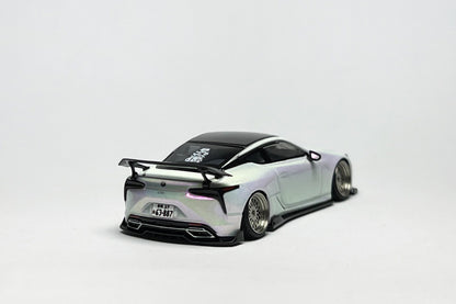 Custom 1:64 Lexus LC500 pearl white diecast model with visible text markings