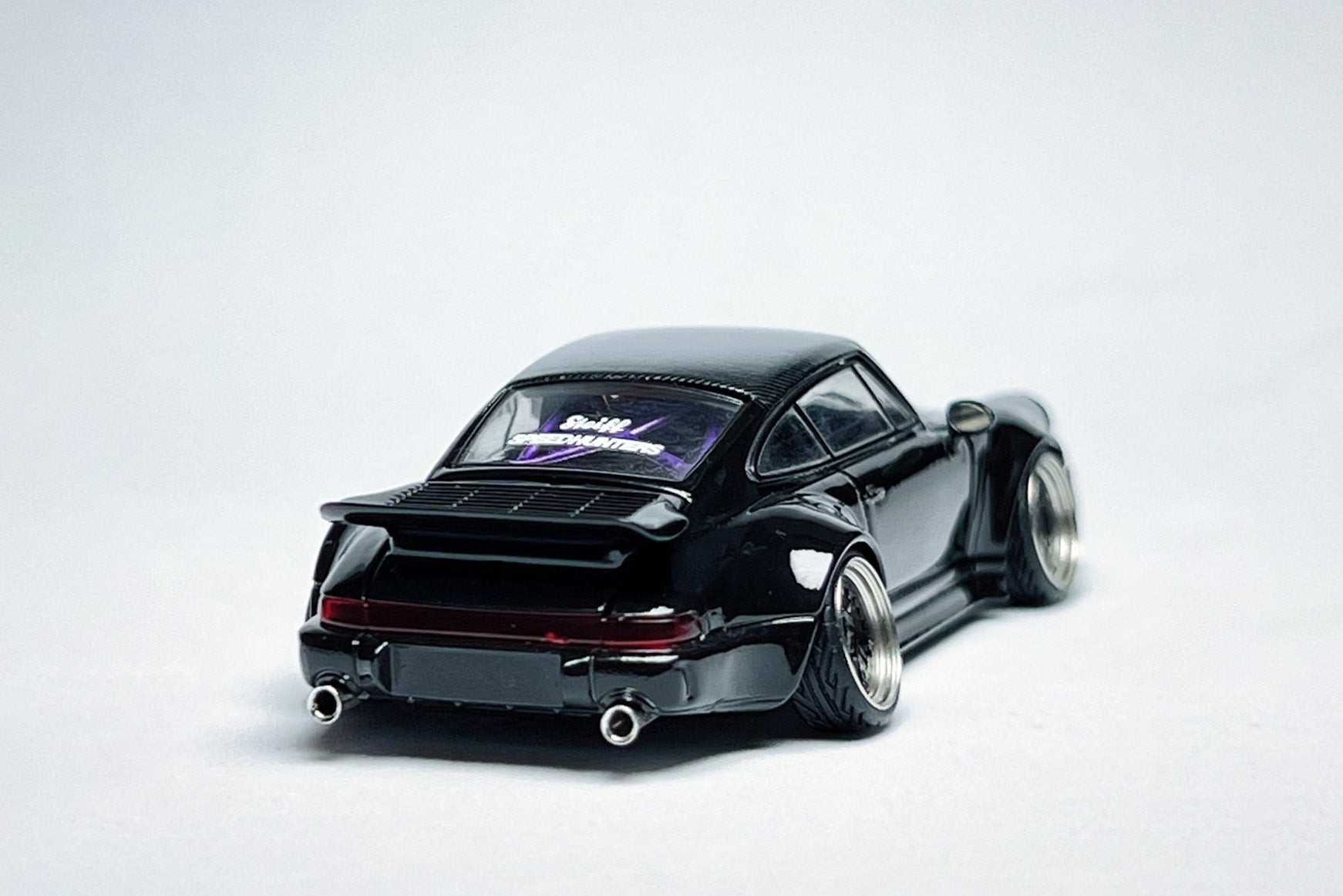 1:64 Porsche RWB 964 Ducktail Black Bird custom diecast with deep-dish bearing wheels