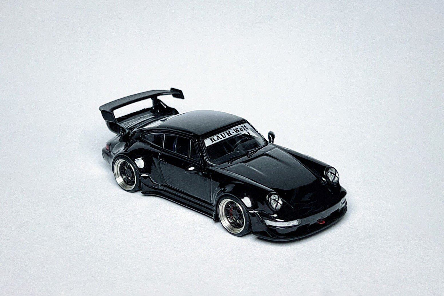 Custom 1:64 Porsche RWB 964 Black Bird diecast model with RWB livery