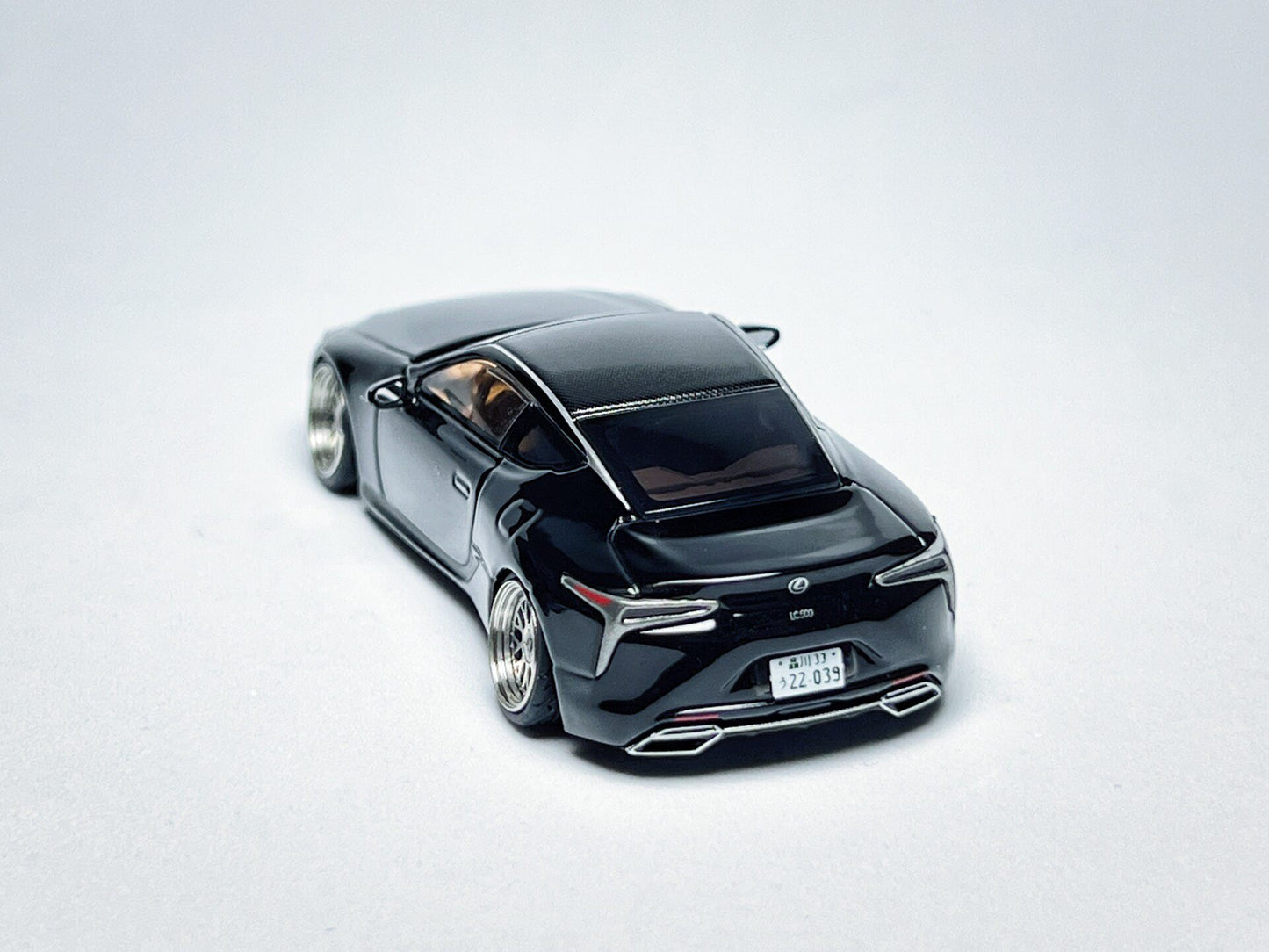 1:64 Lexus LC500 black custom diecast with visible license plate markings