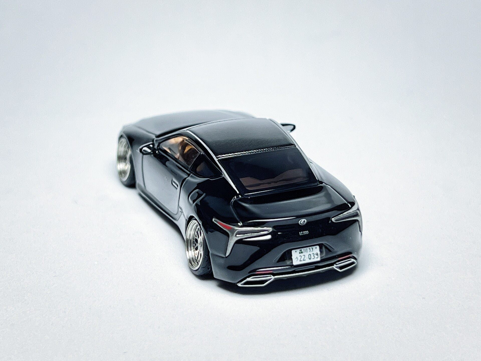 1:64 Lexus LC500 black custom diecast with visible license plate markings