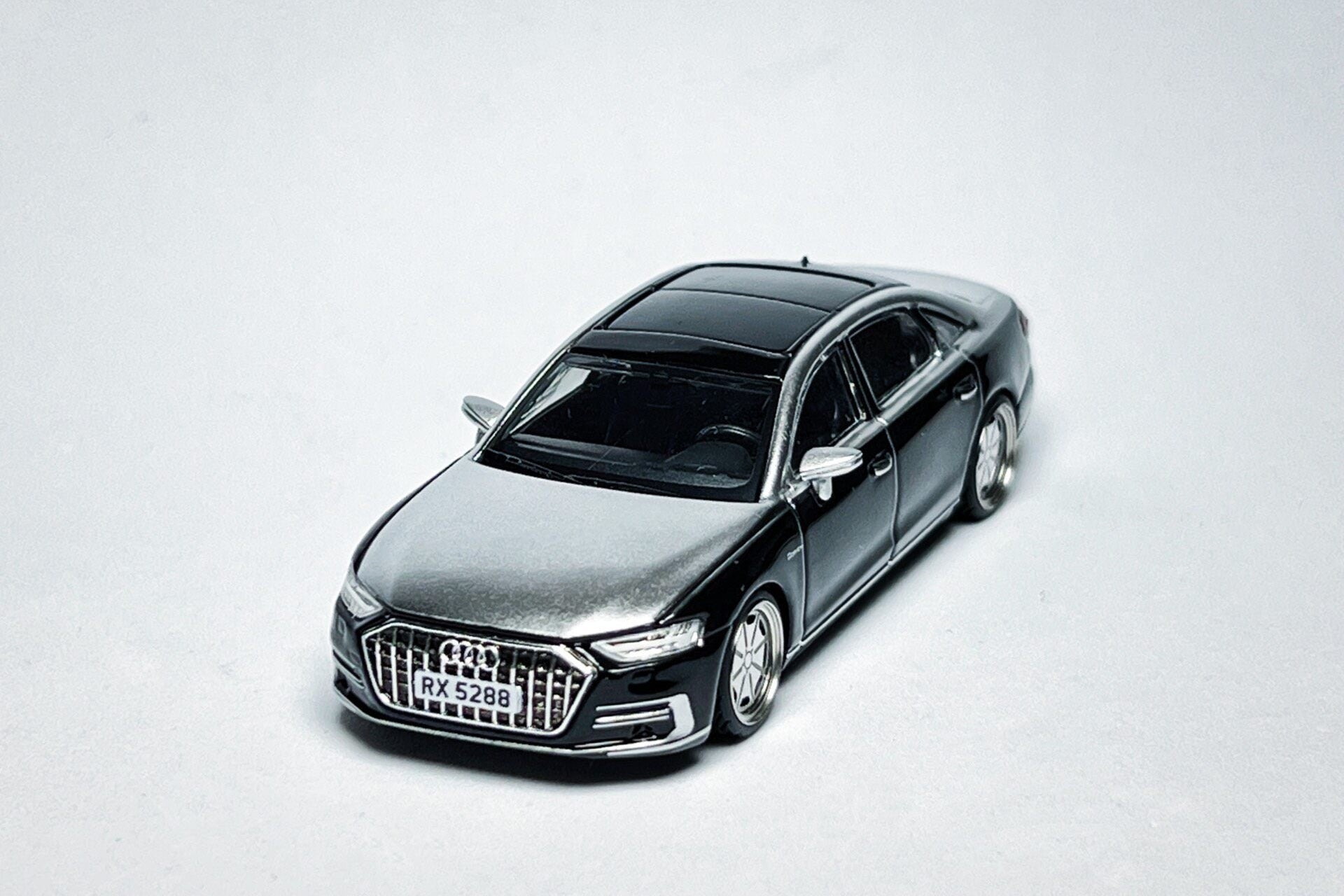 1:64 scale Maisto Audi A8 L Horch black and silver custom diecast with deep-dish bearing wheels