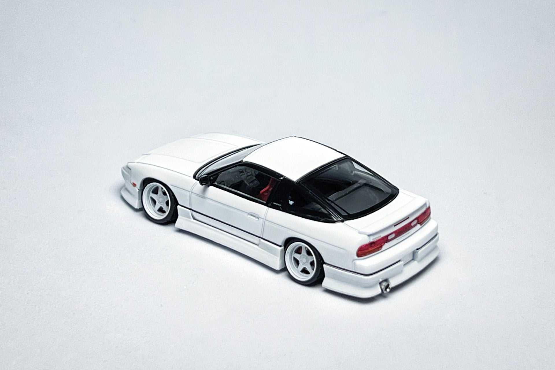 Custom 1:64 Nissan 180SX white diecast model with HSY kit