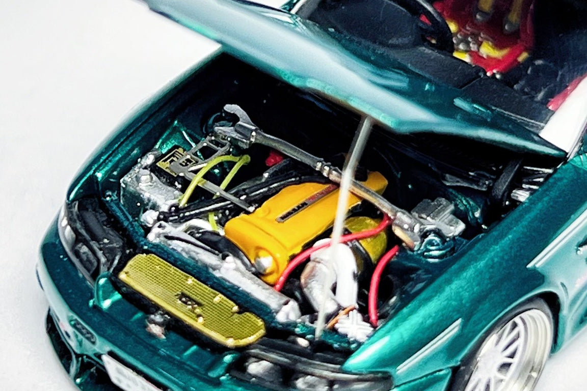 Wheel and rim detail on custom 1:64 Nissan Skyline GT-R R33 400R green diecast