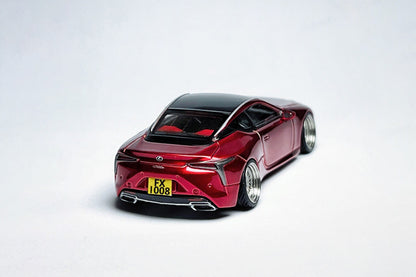 1:64 Lexus LC500h metallic red custom diecast with visible text markings