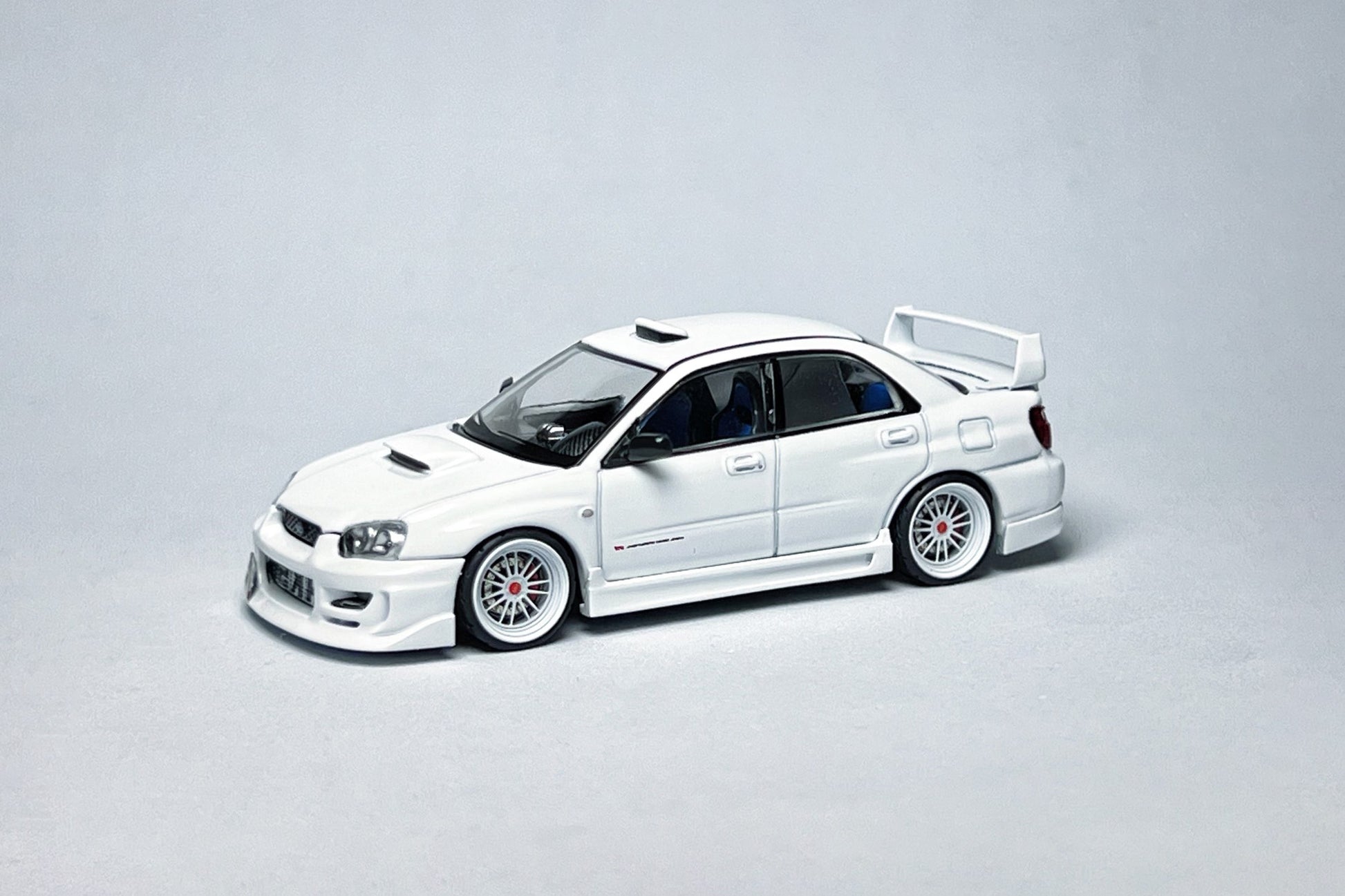 1:64 scale TLV-N337a Subaru Impreza WRX STI white custom diecast with VKS Type 1 kit and deep-dish wheels