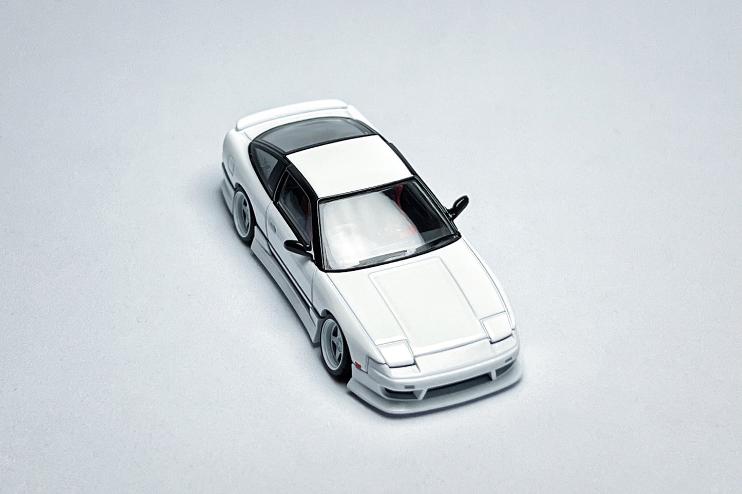 1:64 Nissan 180SX white custom diecast with deep-dish bearing wheels