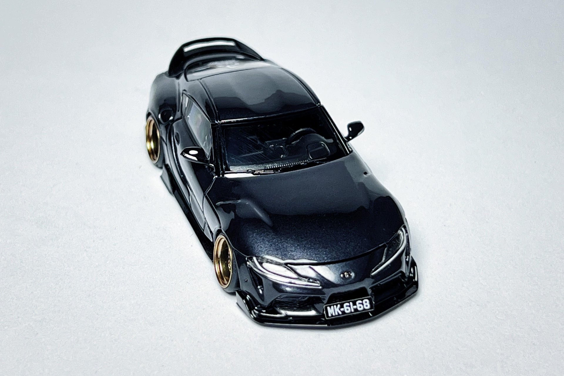 1:64 FH Toyota GR Supra A90 custom diecast with RT64 ADRO ducktail and deep-dish wheels